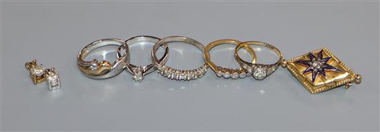 Three 18ct gold and diamond rings, a 9ct gold ring, a platinum, yellow metal and diamond ring, two pendants & a brooch.